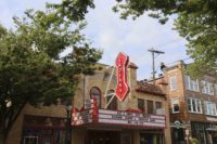 The Buskirk-Chumley Theater marquee is seen from the opposite side of the street