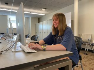 A student works on a desktop in one of Franklin Hall's labs