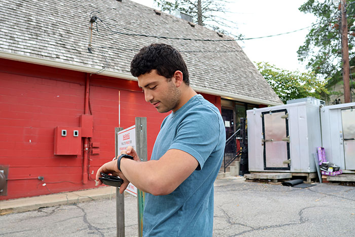 Man using Apple Watch to search the web.