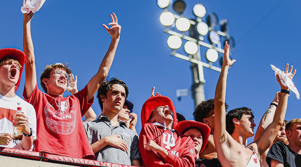 IU fans celebrating at IU vs. Nebraska football game.