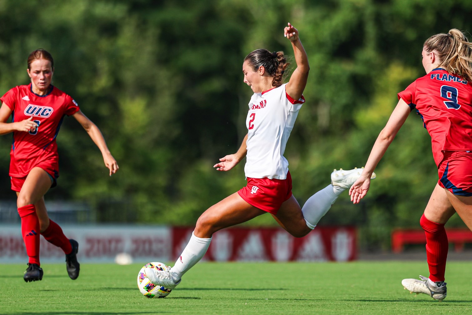 Kennedy Neighbors, the sophomore midfielder shoots for goal against the UIC Flames in a regular season matchup.