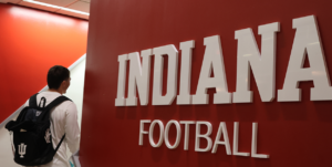 Football linebacker Isaiah Jones walks through Indiana Memorial Stadium