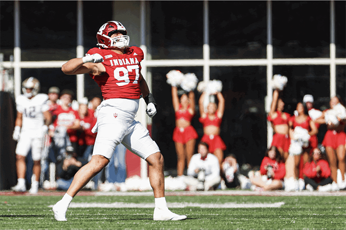 Football player celebrating team.