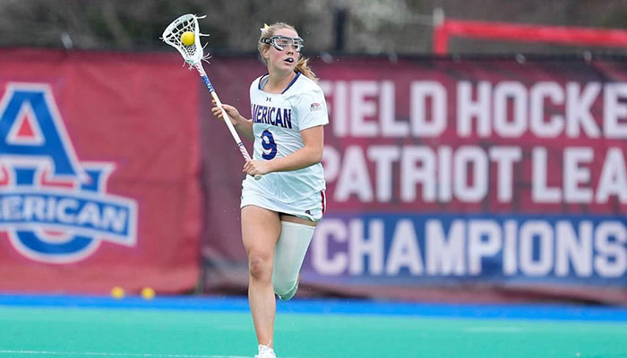 Deidre Brown playing Lacrosse in a game at American University