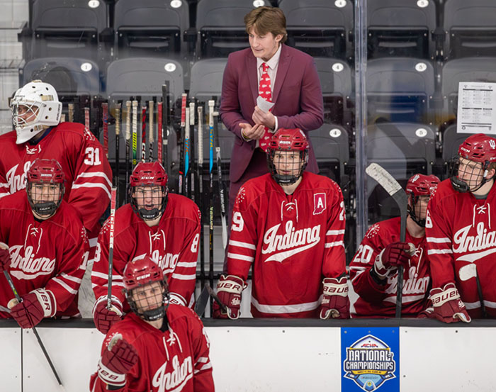 Andrew Gus, the IU Club Hockey Forward Coach, cheers on his players.