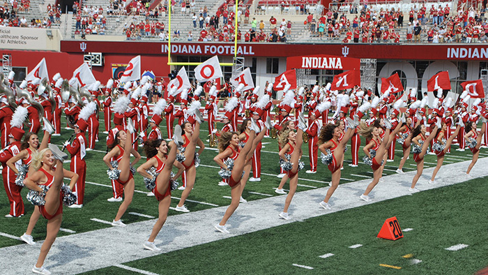 Indiana University Red Steppers performing at football game.