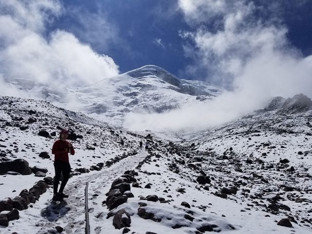 Students climb the snowy slopes of Chimbarazo in Ecuador.