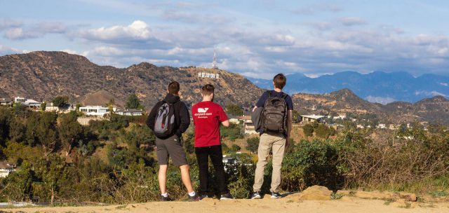 Three people looking at Mount Hollywood