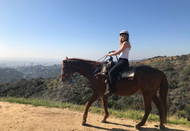 Emma Cline riding a horse